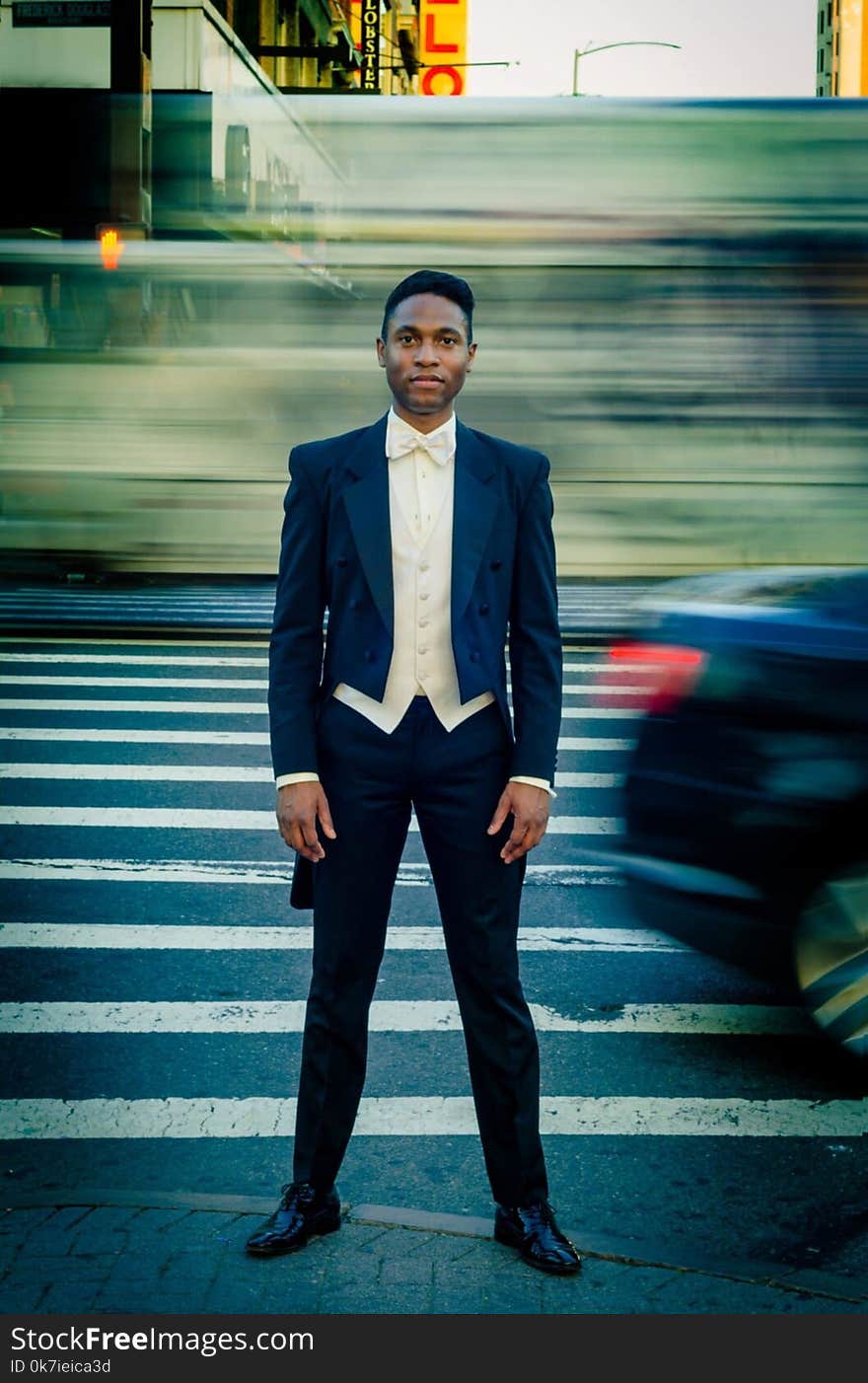 Man in Black Formal Suit Jacket on the Street