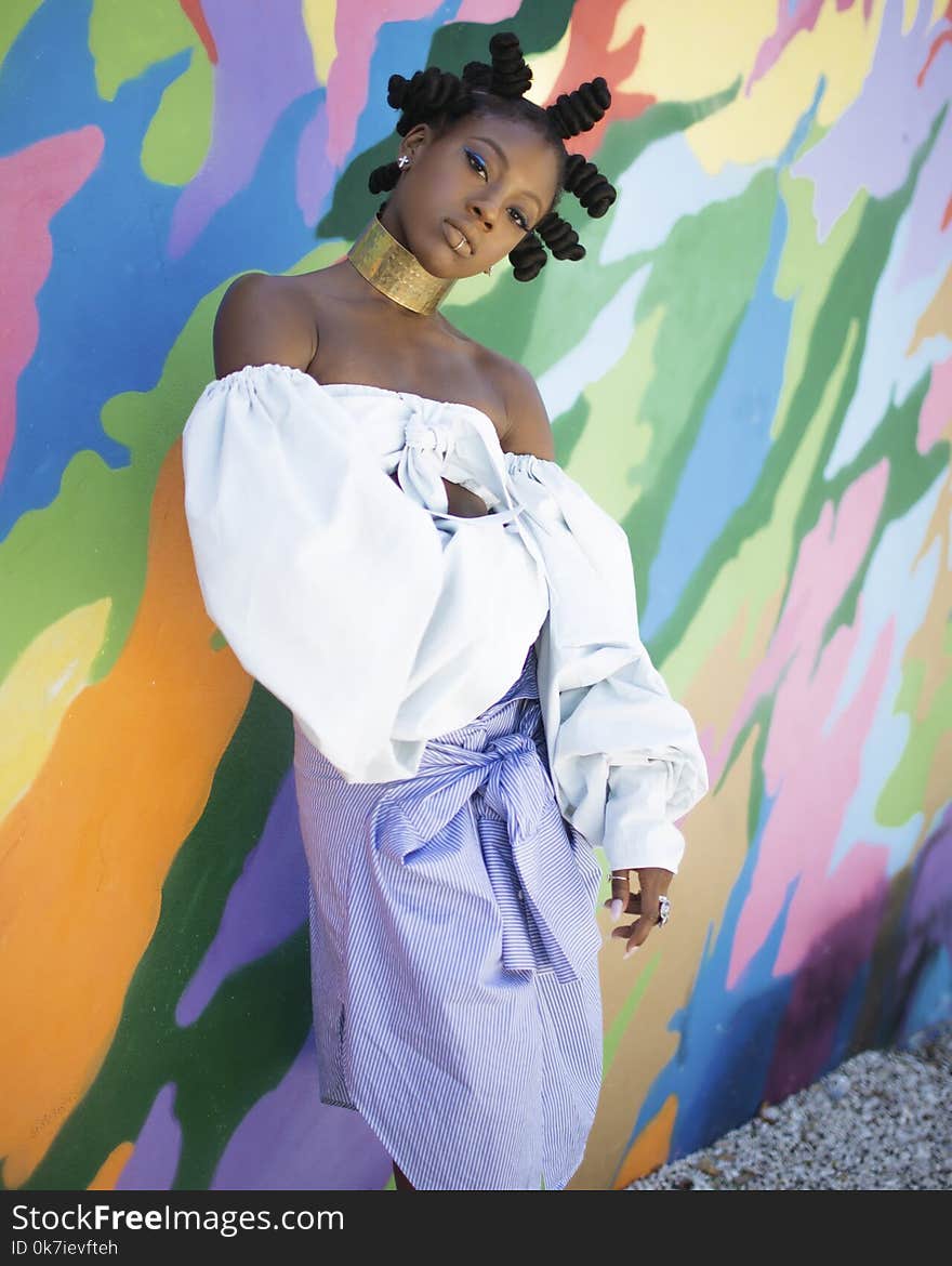 Woman Wearing White Off-shoulder Dress