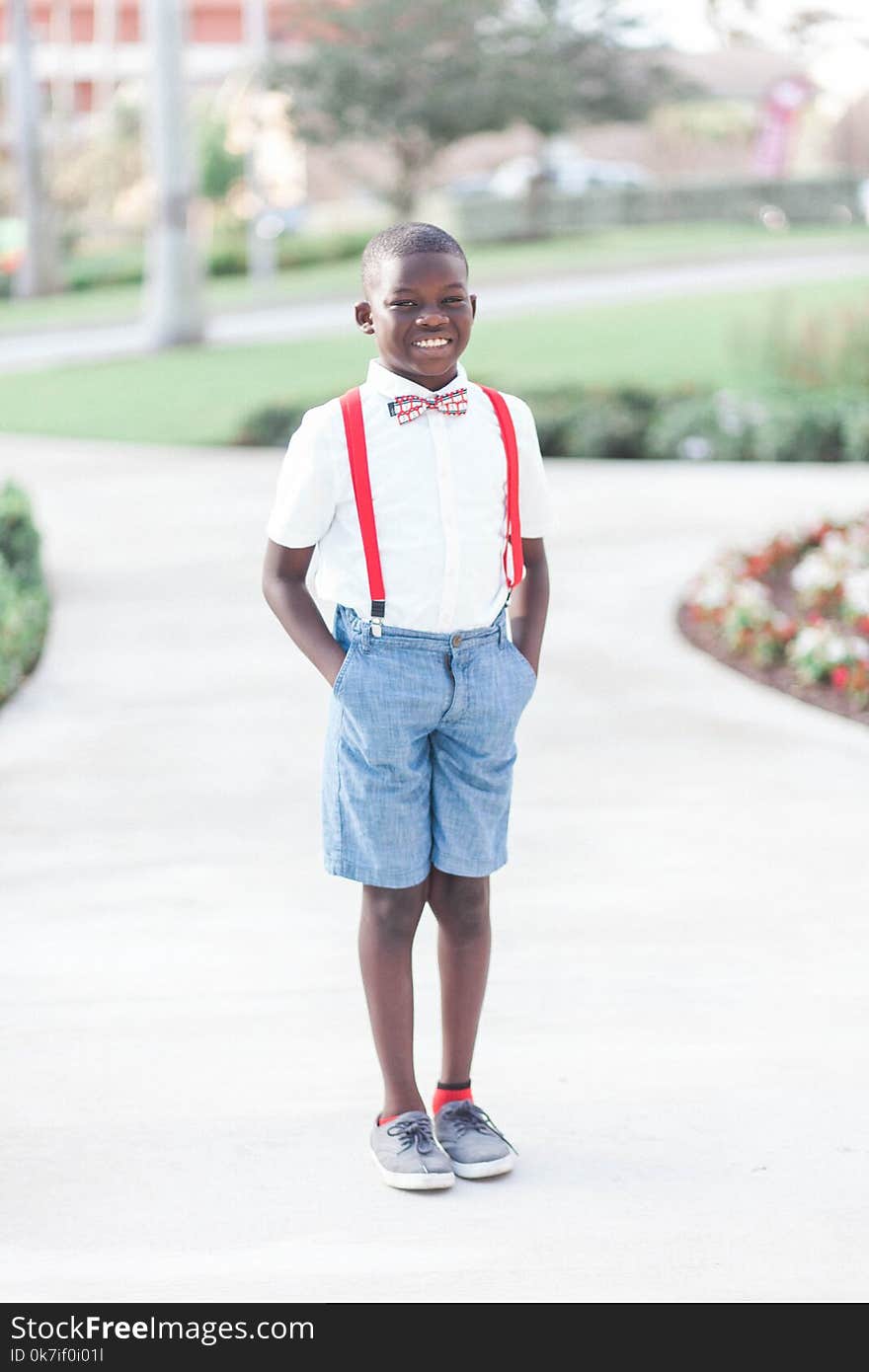 Boy Wearing White Button-down shirt and Blue Denim Shorts