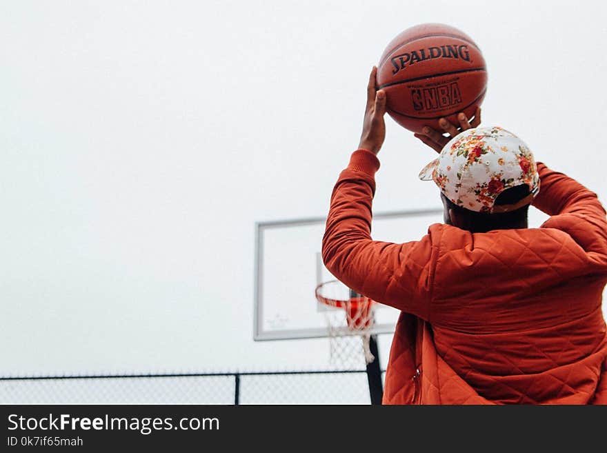 Person Holding Basketball