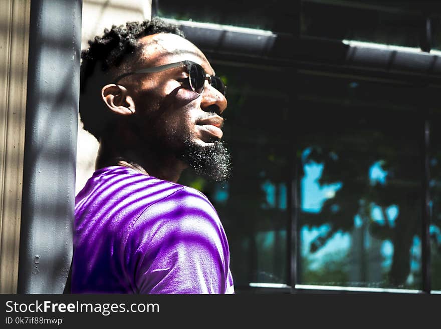 Man Wearing Purple T-shirt