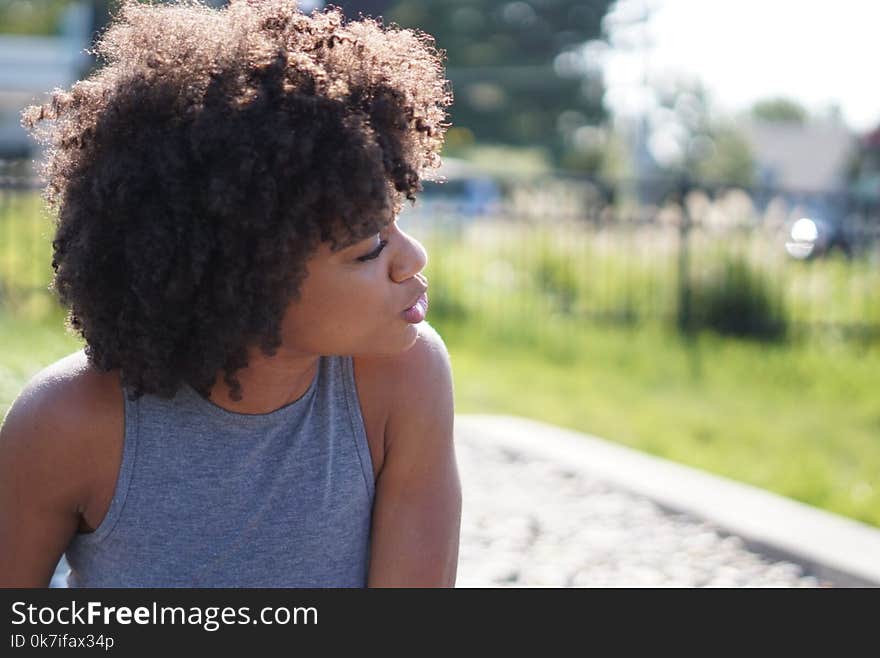 Woman Wearing Gray Tank Top