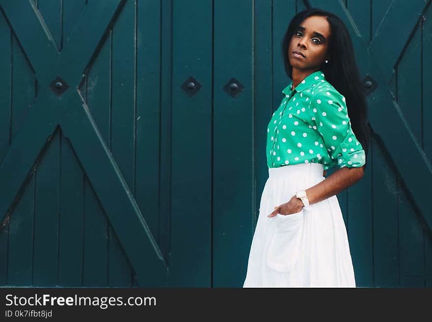 Woman Wearing Green Polka-dot Long-sleeved Dress