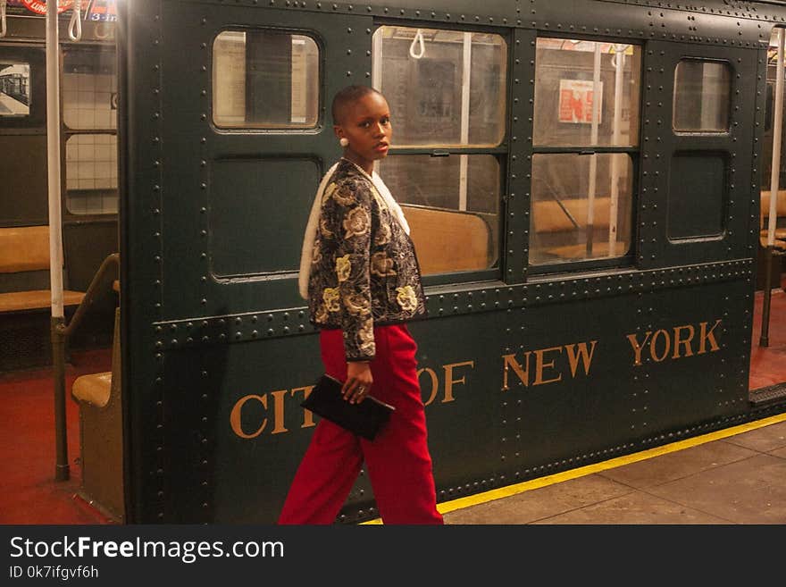 Woman Standing Near Train