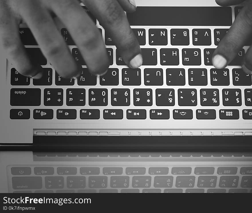 Person&#x27;s Hand on Computer Keyboard