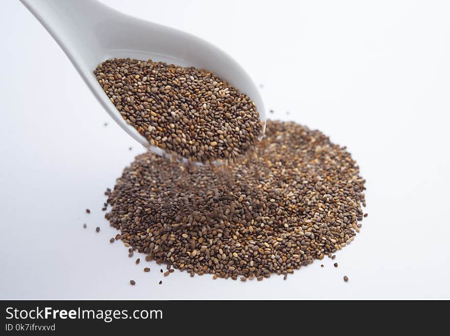 Seeds on White Plastic Spoon