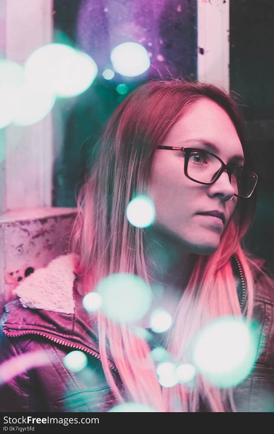 Bokeh Photo of Woman Wearing Eyeglasses