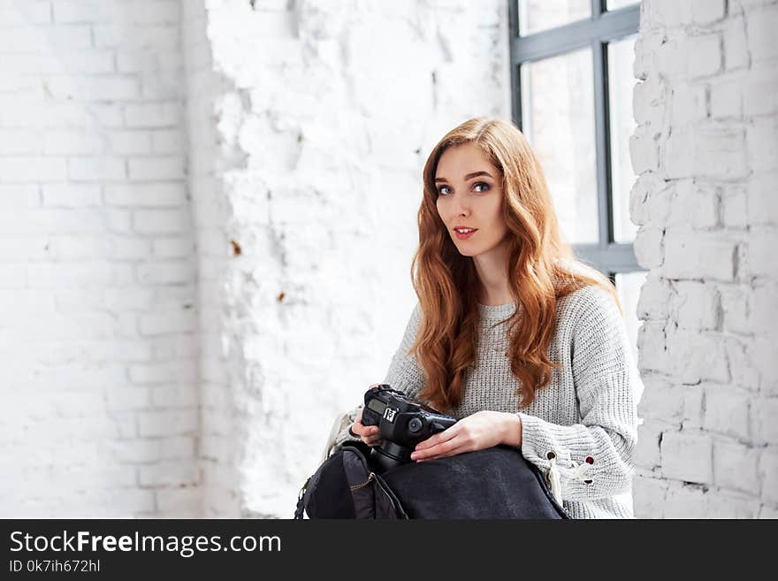 Female photographer with camera