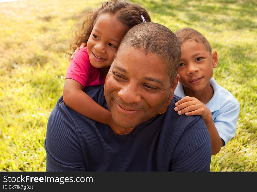 African American Father And His Children.