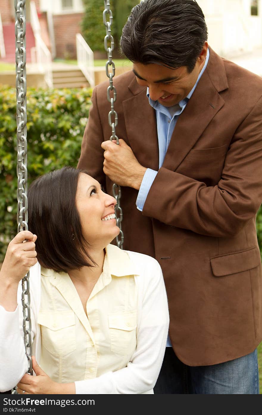 Happy Hispanic couple.