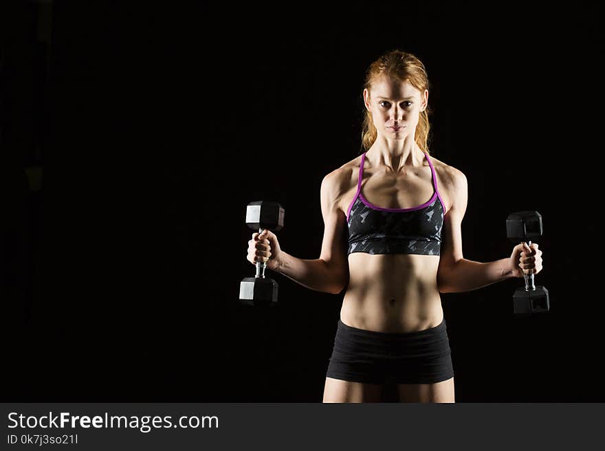 Healthy fit woman exercising.