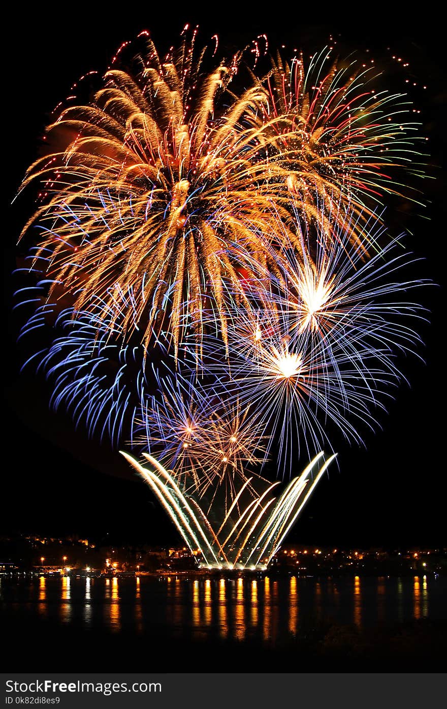 Celebratory bright firework in a night sky