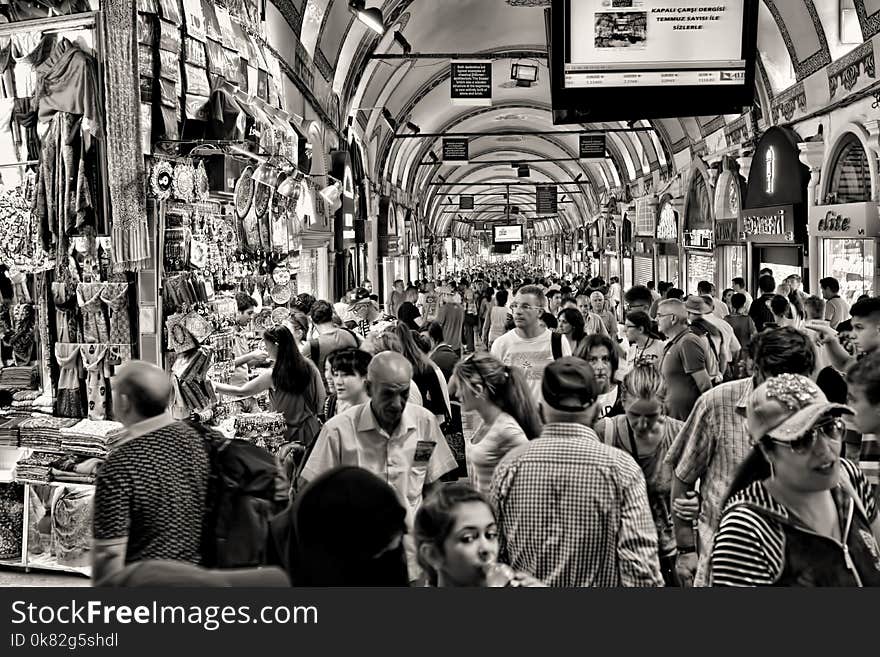 Grayscale Photo of People at Market