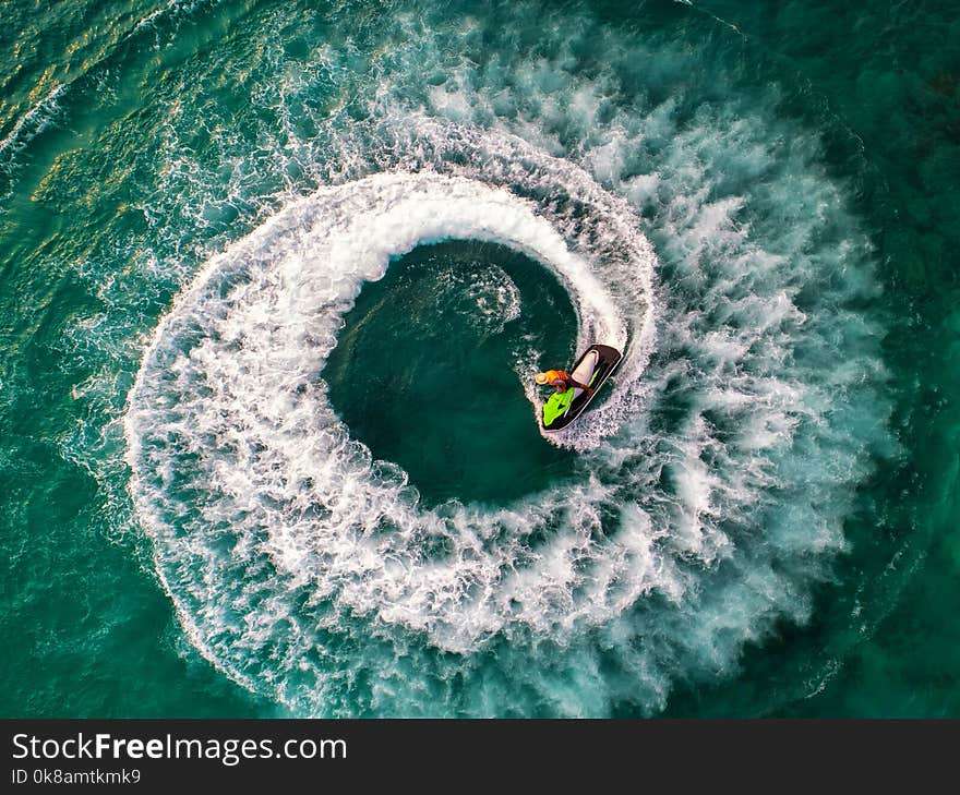 People are playing jet ski at sea during the holidays. background spots