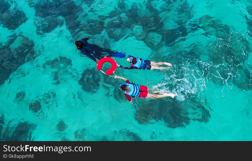 Background blurred People swimming in the sea. Aerial view, Top