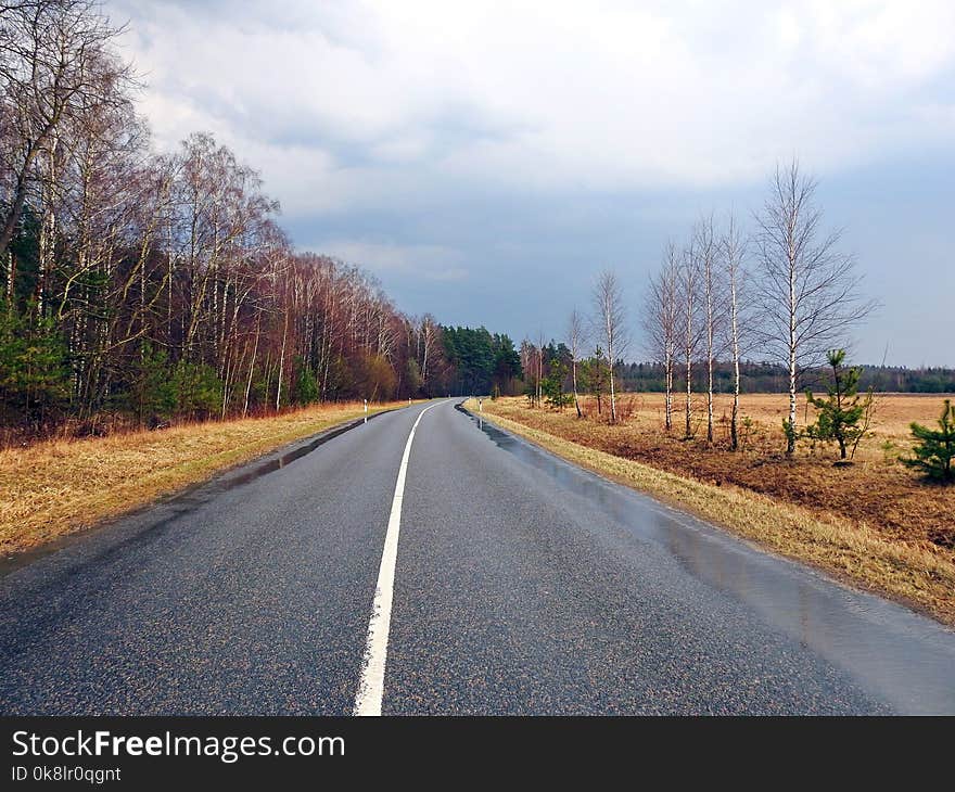 Road and beautiful cloudy sky, Lithuania