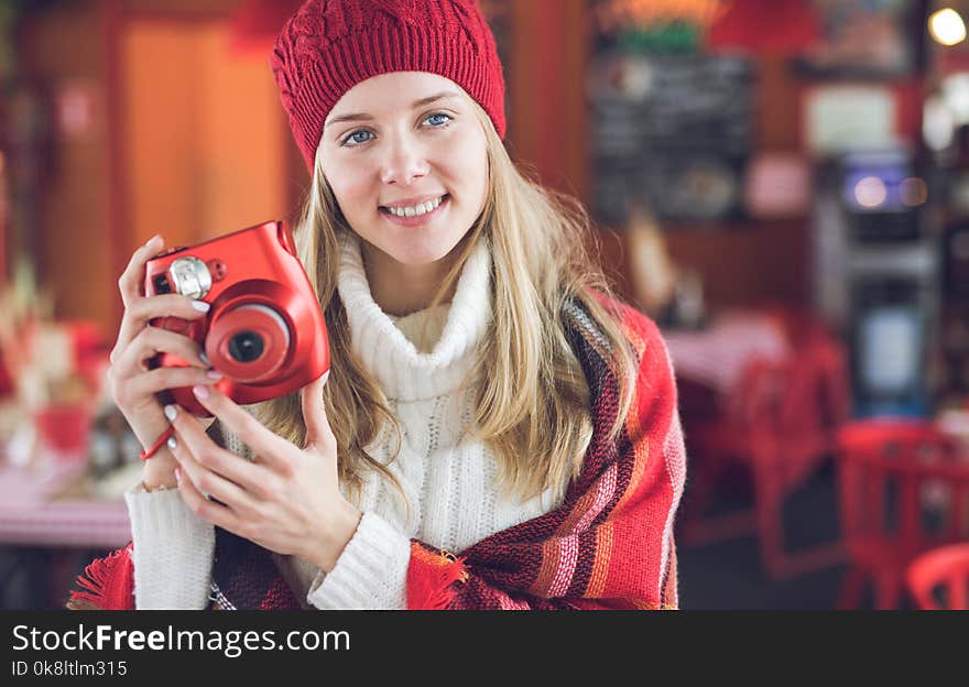 Young girl with polaroid