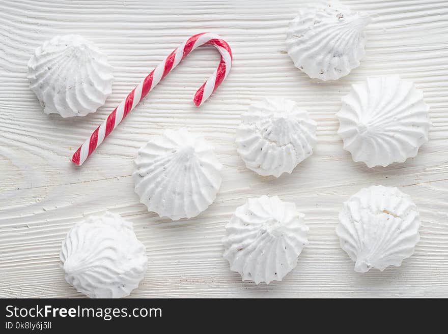 French vanilla meringue cookies close up white christmass background.