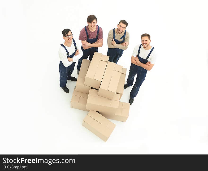 Young movers holding boxes isolated on white background