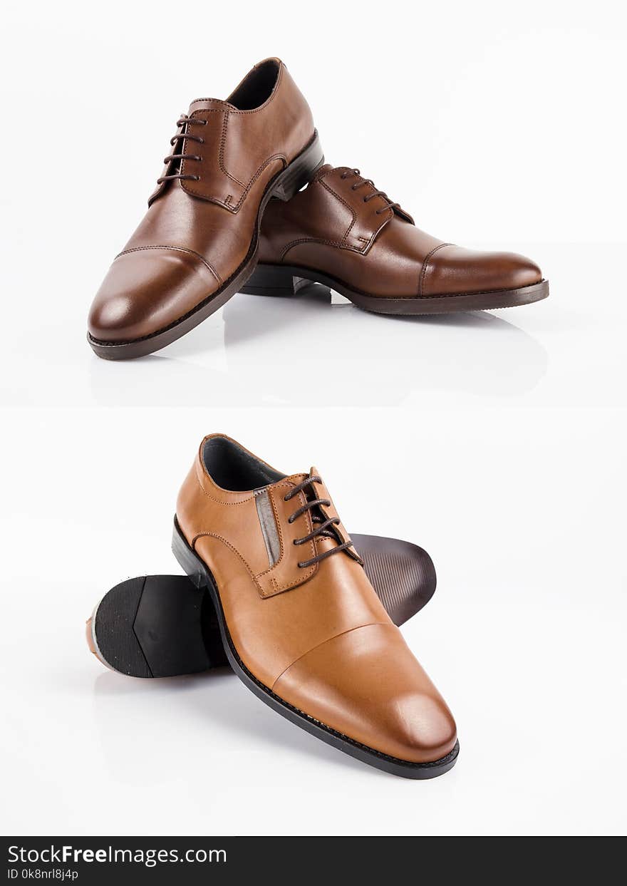 Male Brown leather elegant shoes on black background, isolated Product. Male Brown leather elegant shoes on black background, isolated Product.