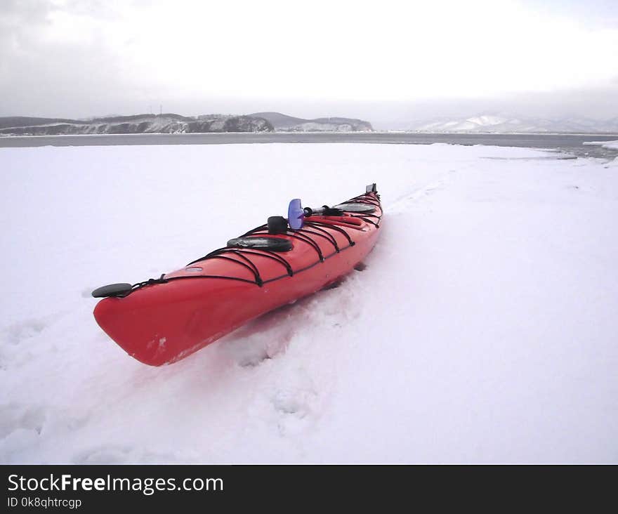 Red kayak on the snow. Red kayak on the snow.