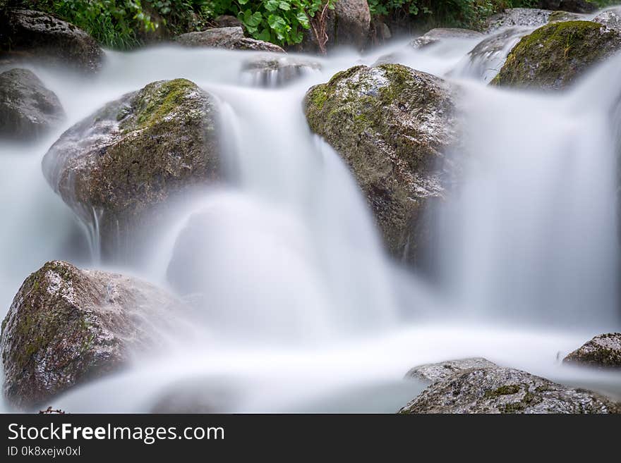 Long exposure of a torrent in the french alps near Chamonix Mont Blanc and the Italian border. Long exposure of a torrent in the french alps near Chamonix Mont Blanc and the Italian border.