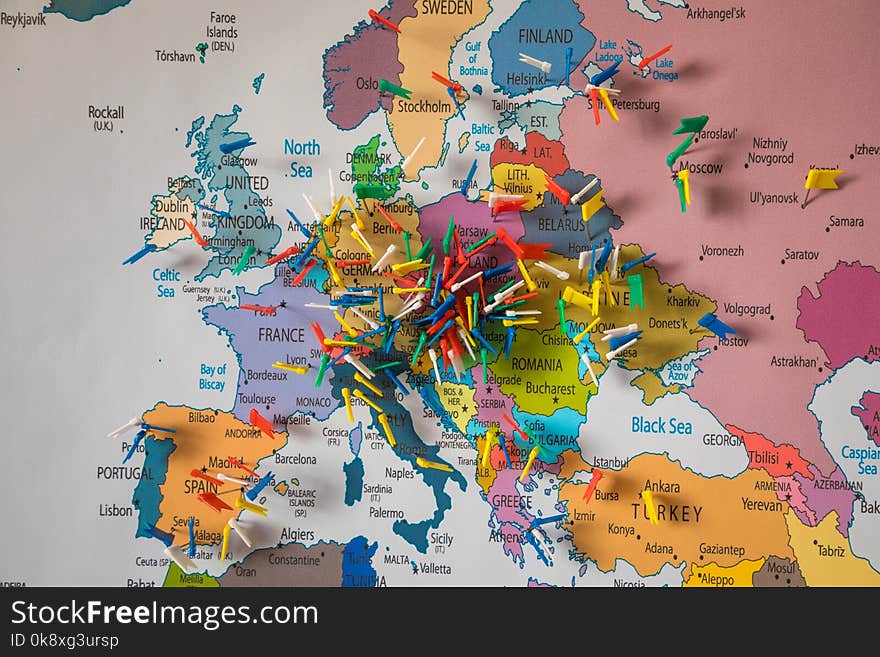 Colored flags on colorful map of Europe. Colored flags on colorful map of Europe