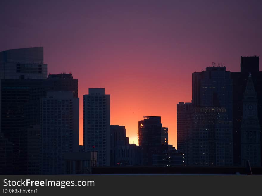 City skyline at sunset, with a colourful view and background. City skyline at sunset, with a colourful view and background