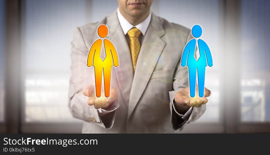 Unrecognizable recruitment agent is comparing two male candidate icons in the open palms of his hands held on same level. HR concept for equal opportunity, cultural diversity, succession planning. Unrecognizable recruitment agent is comparing two male candidate icons in the open palms of his hands held on same level. HR concept for equal opportunity, cultural diversity, succession planning.