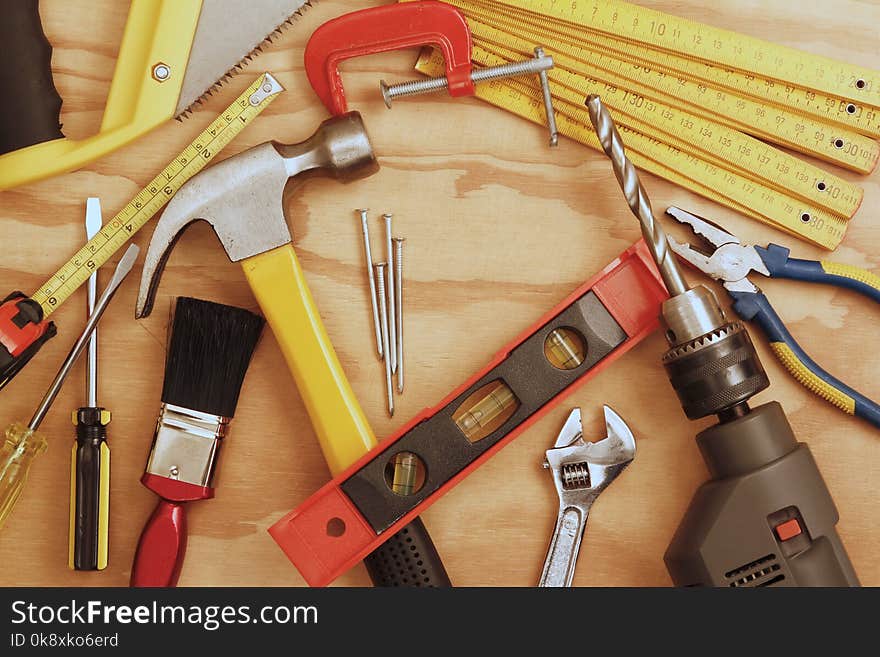 Assorted work tools on wood