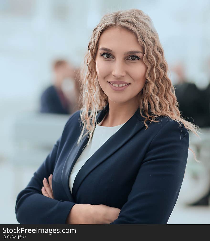 Closeup portrait of successful business woman on the background of the office. the business concept