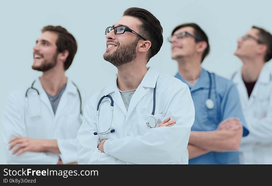 Confident medical team looking at copy space.isolated on white