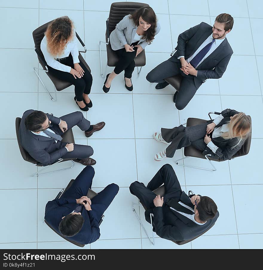 Top view of business team discussing new ideas.