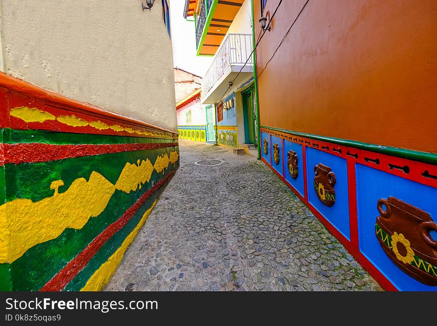 View of the typical mosaic present on the walls of the houses in the streets of Guatapé, Colombia. View of the typical mosaic present on the walls of the houses in the streets of Guatapé, Colombia