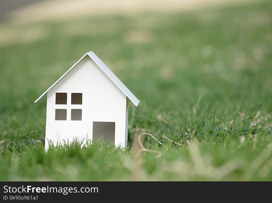 Paper Cut Of House On Nature Background With Copy Space