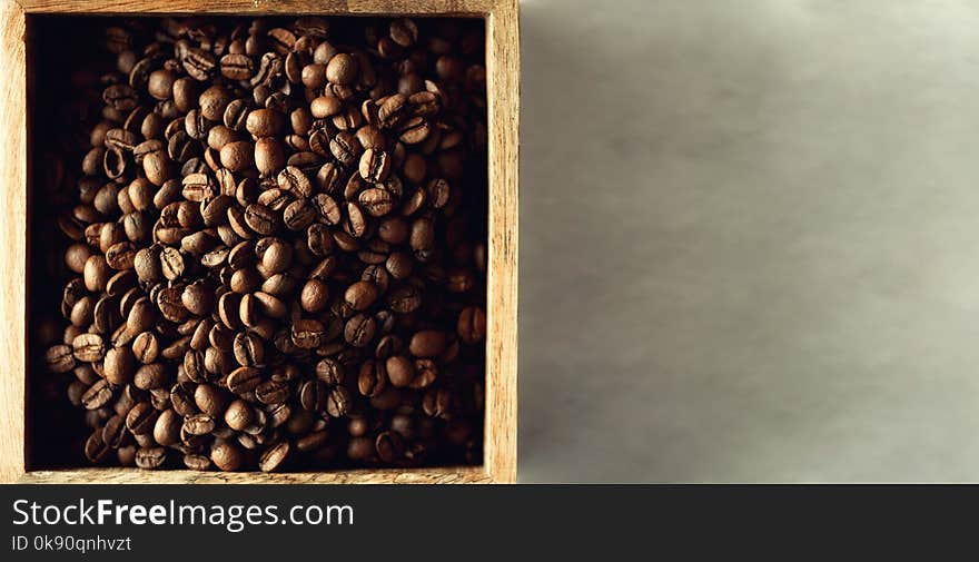 Raw And Roasted Coffee Beans In Wooden Box. Ingredients For Coffee Beverage. Food Background. Banner