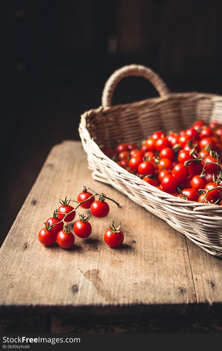 Tomato cherry in basket Tomato in hand South Asia