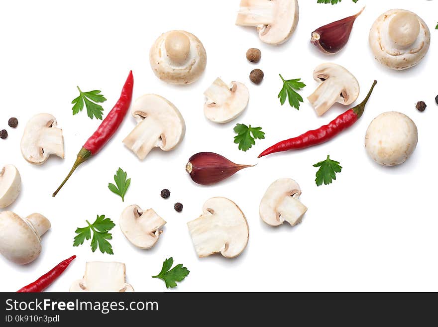 Mushrooms with parsley isolated on white background. top view