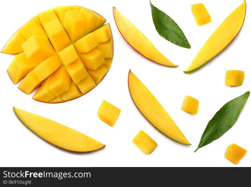 Mango slice with green leaves isolated on white background. top view