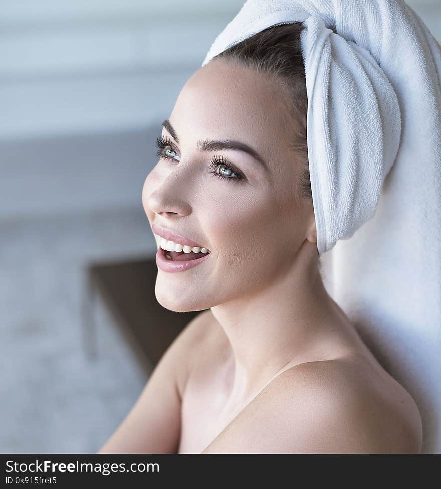 Closeup portrait of a cheerful lady in spa