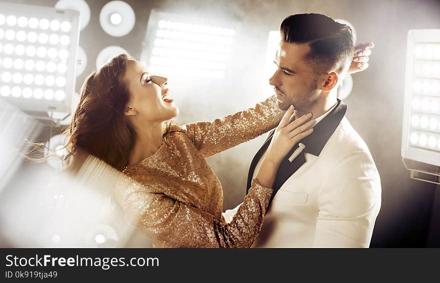 Portrait of a dancing, elegant couple on a party