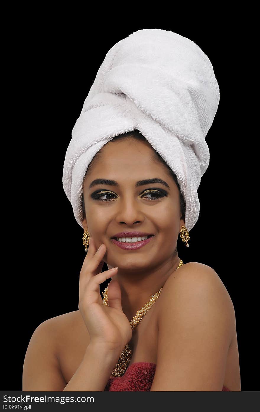 Beautiful woman wearing a towel in her hair