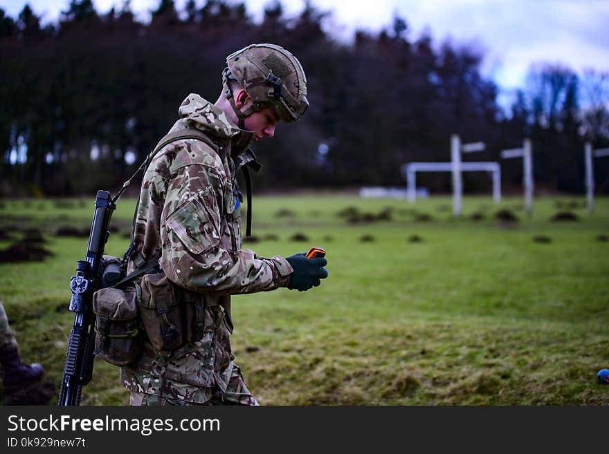 Shallow Focus Photography of Soldier