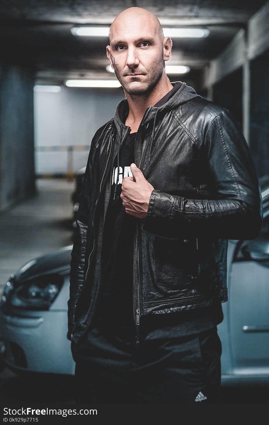 Man Wearing Black Leather Zip-up Jacket