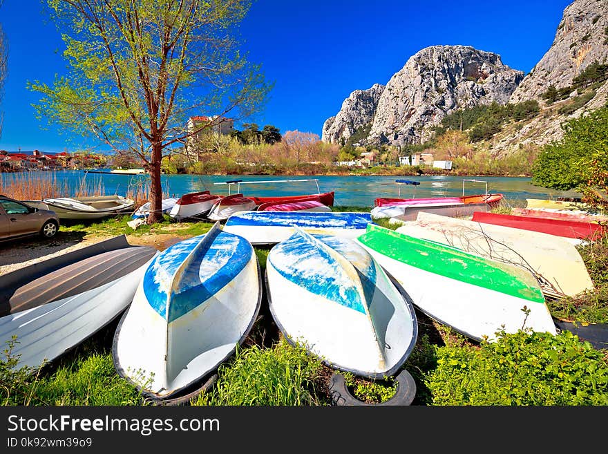 Town of Omis boats on Cetina river view