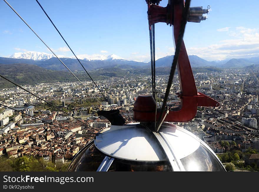 Grenoble eggs aerial tram of Bastille : city overview panorama landscape upon town, buildings, and snowed mountains, in Isere, France. Grenoble eggs aerial tram of Bastille : city overview panorama landscape upon town, buildings, and snowed mountains, in Isere, France