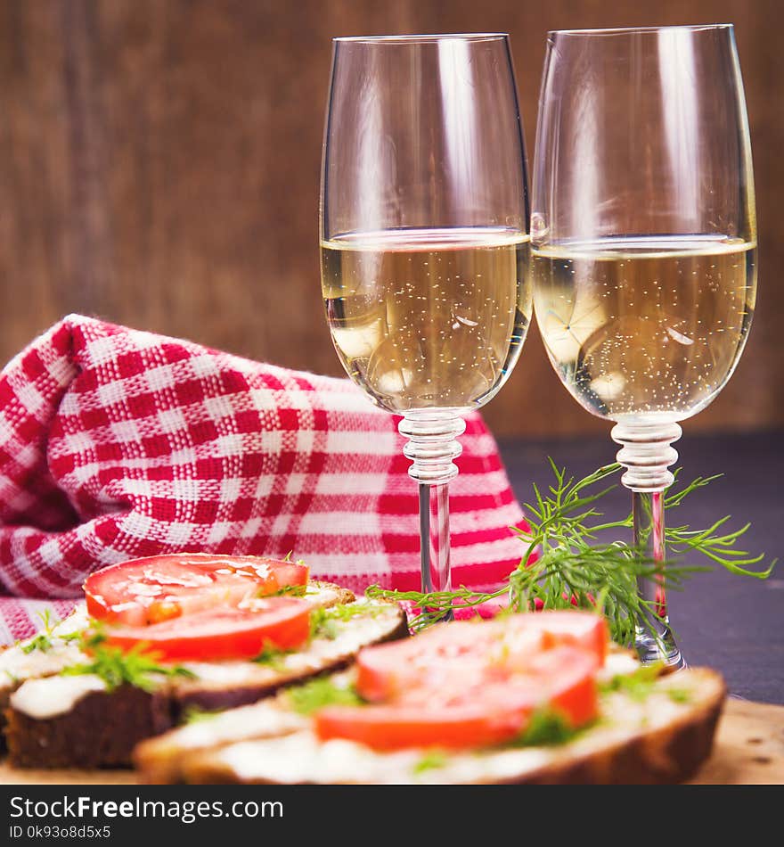 Sandwich from dark bread and white vine on old wooden board. Sandwich from dark bread and white vine on old wooden board