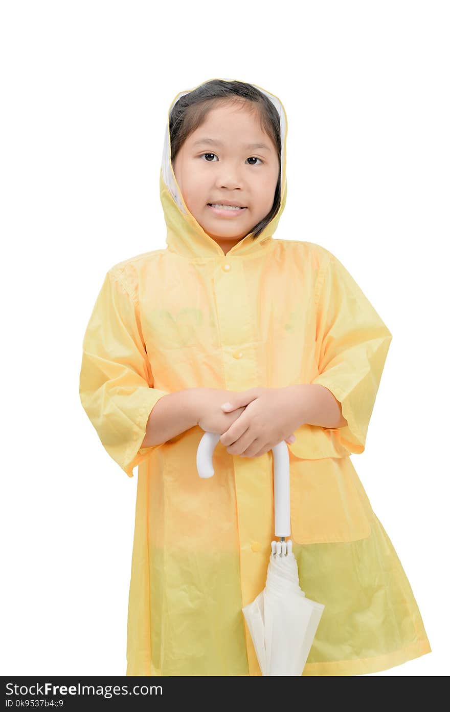 Happy girl is wearing yellow raincoat and holding white umbrella isolated on white background