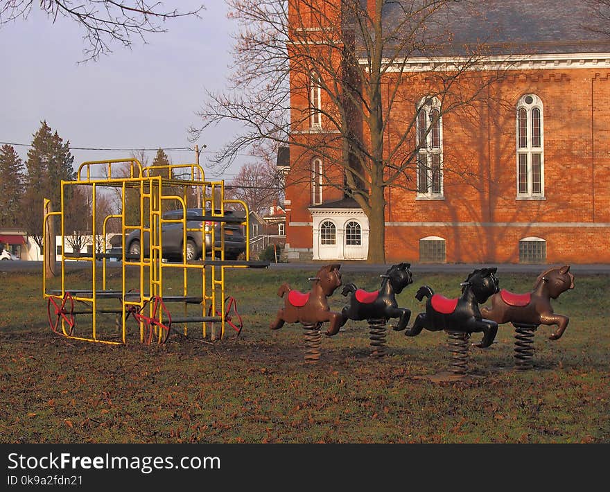 Old fashioned playground equipment in a small village park