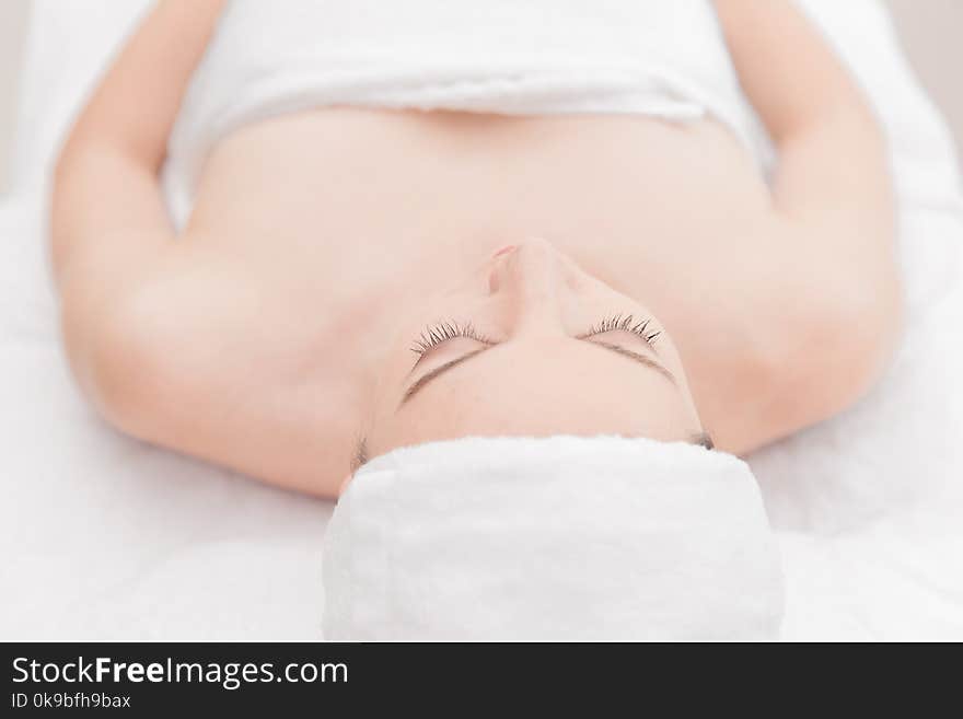 Young woman relaxing at health spa